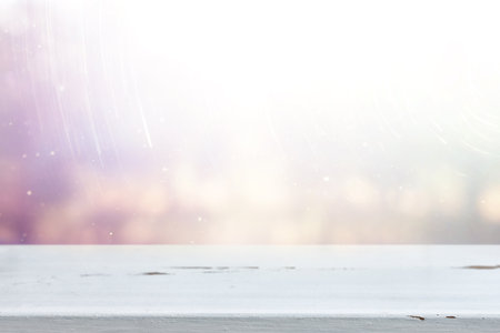 wooden table in front of glitter colorful bokeh lights. For product presentationの写真素材