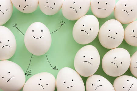 Eggs with funny faces drawn