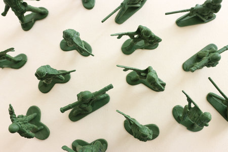 image of toy soldiers over pastel backgroundの写真素材