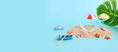 holidays image of tropical sea and beach chairs under umbrellas. Summer travel and vacation conceptの写真素材