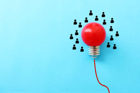 Education concept image. Creative idea and innovation. light bulb metaphor over blue backgroundの写真素材
