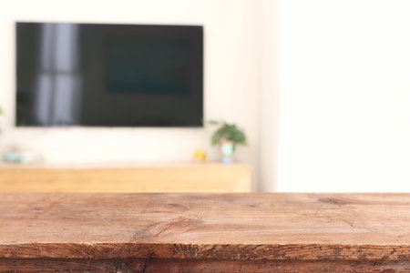 Wooden empty table in front of Living room interior. For product display and presentationの写真素材