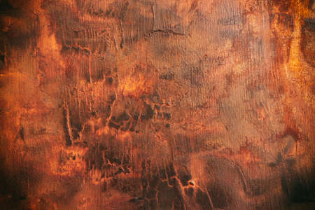 Top view image of textured wooden background with deep brown colors