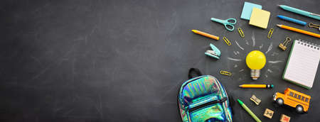 Education concept image. Creative idea and innovation. light bulb metaphor over blackboard backgroundの写真素材