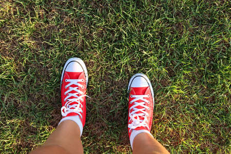 Top view image of girl with red shoesの写真素材