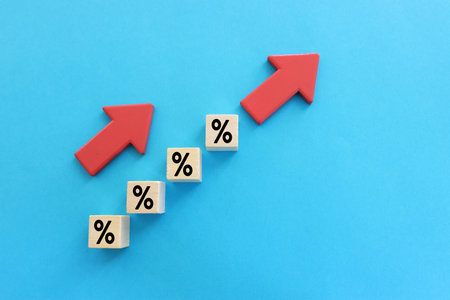arrows with percentage sign going up, concept of business growth, finance and income increaseの写真素材