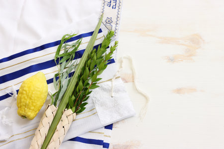 Jewish festival of Sukkot. Traditional symbols (The four species): Etrog (citron), lulav (palm...