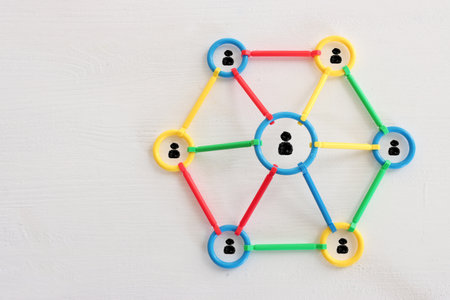 Concept image of unity and teamwork. People icons tied together as a symbol of strength and...