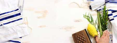 Jewish festival of Sukkot. Traditional symbols (The four species): Etrog (citron), lulav (palm branch), hadas (myrtle), arava (willow)の写真素材