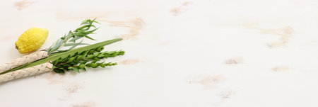 Jewish festival of Sukkot. Traditional symbols (The four species): Etrog (citron), lulav (palm...