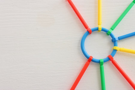 Concept image of unity and teamwork. Puzzle pieces tied together as a symbol of strength and partnershipの写真素材