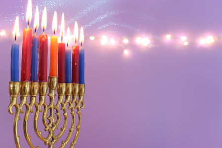 Image of jewish holiday Hanukkah with menorah (traditional candelabra) and candlesの写真素材