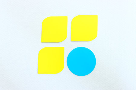 Concept of unique thinking. Paper shapes of the same color versus a different one