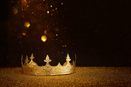 low key image of beautiful queen or king crown over glitter table. fantasy medieval periodの写真素材
