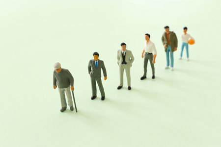Concept image on age. Characters from young to old. Life cycleの写真素材