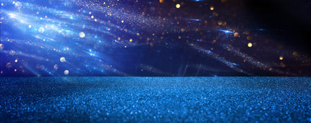 background of abstract glitter lights. gold, blue and black. de focusedの写真素材