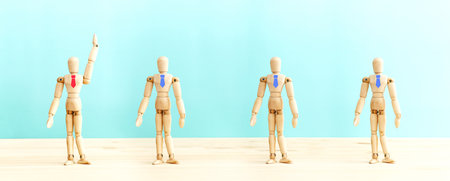 Wooden figures with ties, idea of leadership, recruitment of personnel and hr