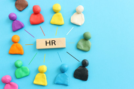 image of people figures and cube with the text HR, leadership and management conceptの写真素材