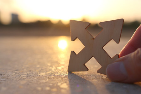 Arrow sign pointing ahead. Concept of challenge and looking forwardの写真素材