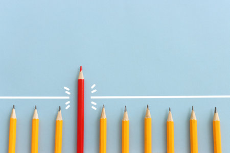 image of Pencil overcoming barrier obstacleの写真素材