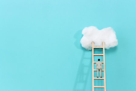Concept image of ladder reaching the clouds, goal achieving and leadership ideaの写真素材