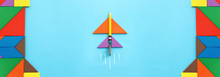 Concept image of a pencil in an airplane metaphor. Idea of leadership and educationの写真素材