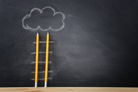 Concept image of ladder made from pencil and chalkboard backgroundの写真素材