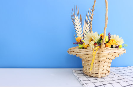 Photo of dairy products over blue background. Symbols of holiday - Shavuotの写真素材