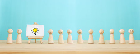 Education concept image. Creative idea and innovation. light bulb metaphor over blue backgroundの写真素材