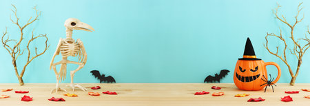 holidays image of Halloween. pumpkin cup over wooden tableの写真素材