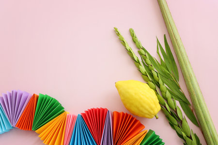 Jewish festival of Sukkot. Traditional symbols (The four species): Etrog (citron), lulav (palm...