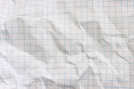 Top view image of crumpled white grid paper backgroundの写真素材