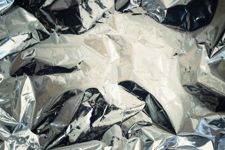 Abstract image of metallic silver folded paper