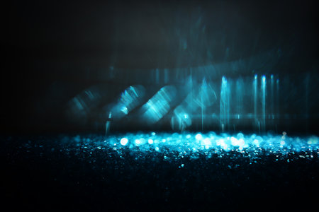 abstract glitter blue and black lights background. de-focusedの写真素材