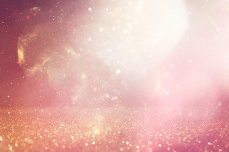abstract glitter pink and gold lights background. de-focusedの写真素材
