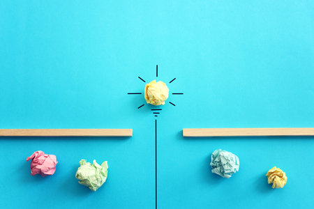 Education concept image. Creative idea and innovation. light bulb metaphor over blue backgroundの写真素材