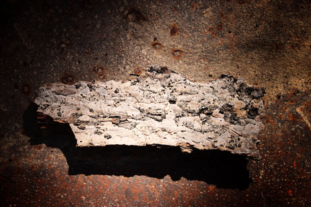 Close up image of abstract metallic textured background and wooden log plankの写真素材