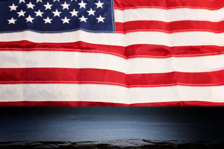 Background of American flag with festive bright lights and empty table
