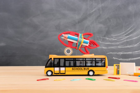 Back to school concept over classroom blackboard. Top view