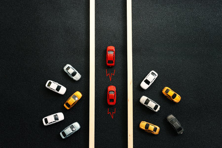 Concept image of cars following the leader. Idea of success and teamworkの写真素材