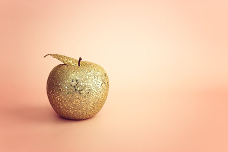 Golden apple concept, idea of achievement and successの写真素材