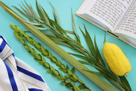 Jewish festival of Sukkot. Traditional symbols (The four species): Etrog (citron), lulav (palm...
