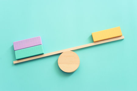 Concept image of wooden scale. Idea of measurement and finding balanceの写真素材