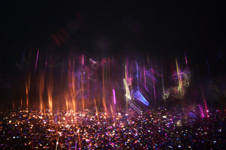 Background purple and pink lens flare lights. Abstract image