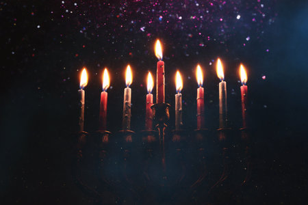 Religion image of jewish holiday Hanukkah background with menorah (traditional candelabra) and...