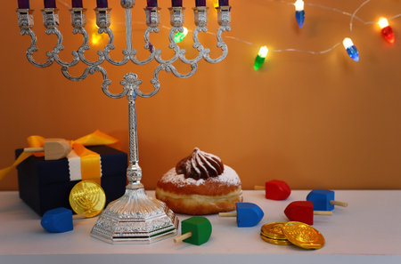 Religion image of jewish holiday Hanukkah background with menorah (traditional candelabra) and candlesの写真素材