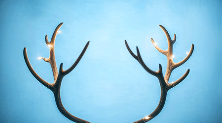 Antlers of a stag with a garland of lightsの素材