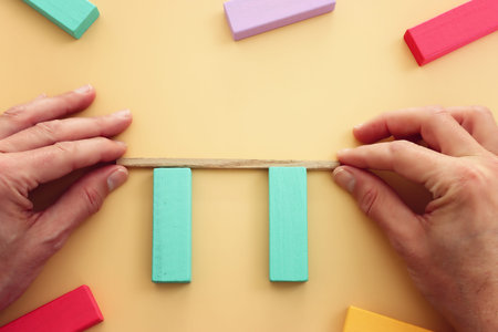 Concept image of hands building bridge. idea of teamwork, collaboration, and risk
