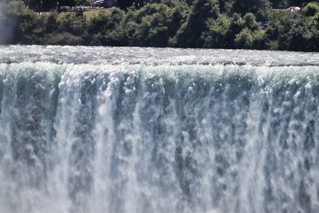 Water pouring over Niagara Falls  Image shows the water as it falls over the Horseshoe Fallsの写真素材