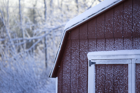 9 January 2015; Alden, NY - Snow from a lake affect storm adorns the side of a shed in the Western New York area. This image shows a little of the beauty of the light, powdery snow that's blanketed the area.の写真素材